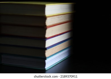 rainbow book pile banned books education - Shutterstock ID 2189370911