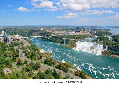 Rainbow Bridge And American Falls Over River With Blue Sky