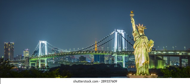 Rainbow Bridge by night, Odaiba, Tokyo, Japan - Powered by Shutterstock