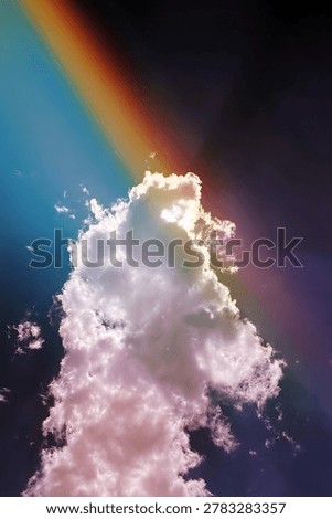 Rainbow and Clouds in Bright Blue Sky. A vivid rainbow with distinct color bands across a deep blue sky and fluffy clouds, perfect for nature, weather, and atmospheric design projects.