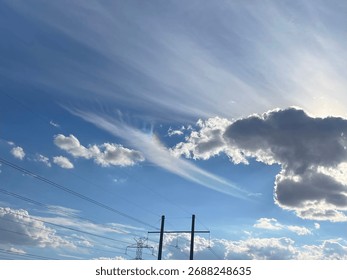 Rainbow and clouds intermingle and is amazing!