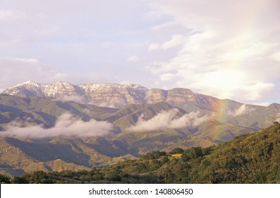 Rainbow and clouds over the Topa Topa Mountains in Ojai, California