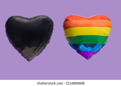 A rainbow color and a black heart shaped baloon against very peri background. LGBT liberation and black lives matters abstract concept. - Powered by Shutterstock