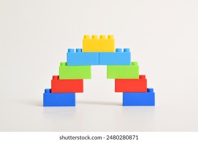 A rainbow color lego stairs isolated on white background. Building Blocks