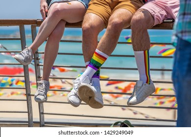 Rainbow colored socks at 21th annual Tel Aviv Pride Week. At the parade, people walking, dancing, singing, waving banners and rainbow flags celebrating the largest LGBT event in the middle east.