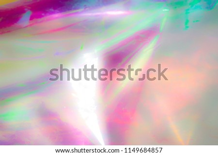 Rainbow colors, psychedelic pattern, holographic background. Magical marble and iridescent effect for banner templates and wallpapers. Pink shades. 