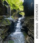 Rainbow Falls is located about halfway up the Gorge trail just before Triple Cascade. The waterfall is 95-101 feet high, but parts are obscured from view, so it appears slightly shorter.