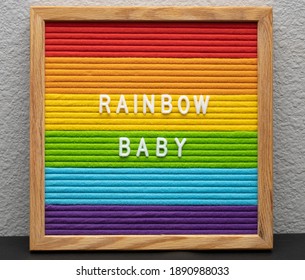 Rainbow Felt Letter Board With White Letters Displaying Rainbow Baby