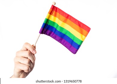 Rainbow flag depicting gay pride and rights against a white background