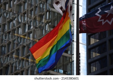 Rainbow Flag, Gay Pride Flag Flying From A Flag Pole In The Breeze, LGBT, Red, Orange, Yellow, Green, Blue