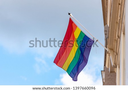 Similar – Rainbow flag on a house