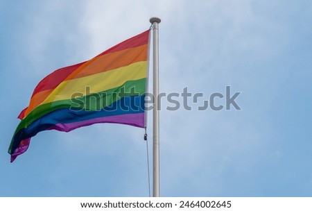 Similar – Rainbow flag on a house