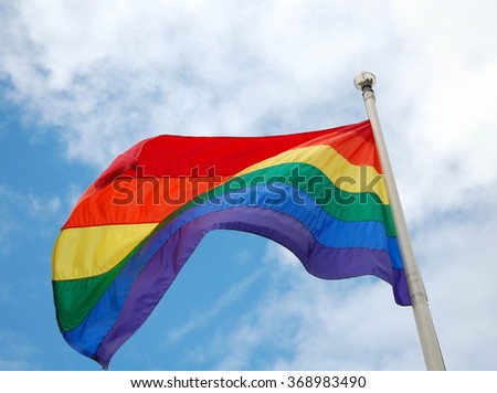 Similar – Rainbow flag on a house