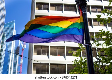Rainbow flag on a sign post in San Francisco California.