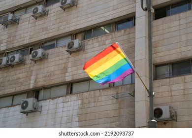 A Rainbow Flag Posted On A Typical Jerusalem, Israel, Office Building, As Pride Parade Decoration.