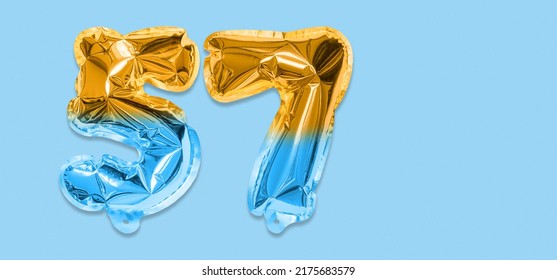 Rainbow Foil Balloon Number, Digit Fifty Seven On A Blue Background. Birthday Greeting Card With Inscription 57. Top View. Numerical Digit. Celebration Event, Template. Banner