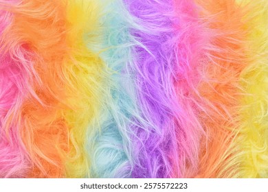 Rainbow fur background close up. Rainbow hair coloring. Bright abstract fur background with copy space.