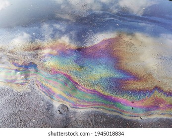 Rainbow Gasoline Film In A Puddle