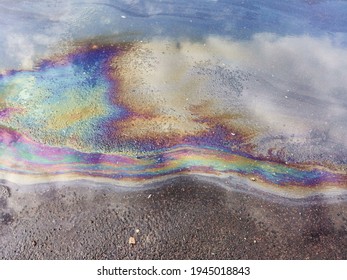 Rainbow Gasoline Film In A Puddle