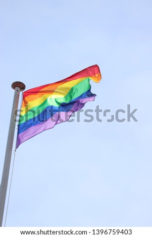 Similar – Rainbow flag on a house