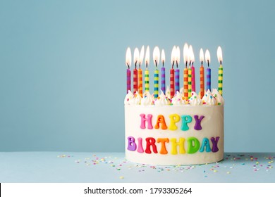 Rainbow Happy Birthday Cake With Colorful Candles