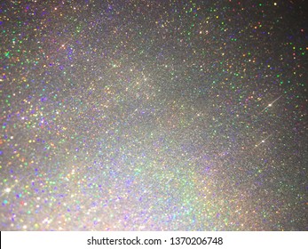 Rainbow And Holo Silver Glitter Sparkling Texture And Bokeh Abstract Background