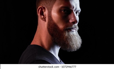 Rainbow man silhouette, young male shot in colorful bright lights posing in studio. Art design, colorful male concept over black background Closeup shot - Powered by Shutterstock