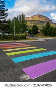 Rainbow marked crosswalk supporting equal rights for LGBT people community. Reydarfjordur - Eastfjords (Austfirðir), Iceland