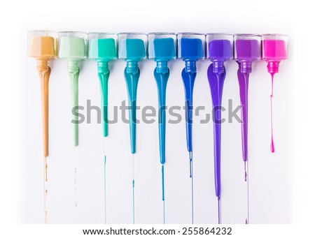 rainbow of nail polish isolated on a white background