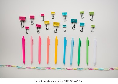 Rainbow Office Supplies Organized On White Table