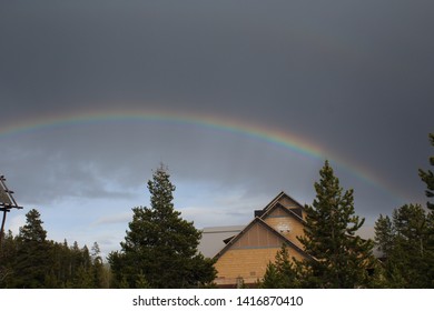 Rainbow At Old Faithful Lodge