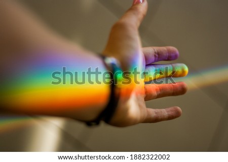 Similar – Foto Bild Frauenhand mit einem darin projizierten Regenbogen