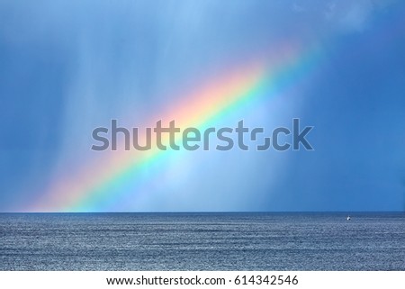 Rainbow on the ocean horizon
