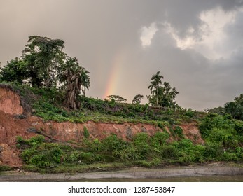  Rainbow Over The Bank Of Amazon River Latin America. Peru.