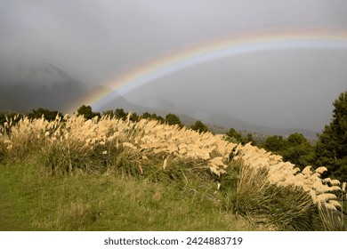 Rainbow over mount Taranaki, New Zealand