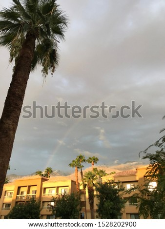 Similar – Wunderschön leuchtender Regenbogen über dem Meer