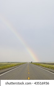 Rainbow over road