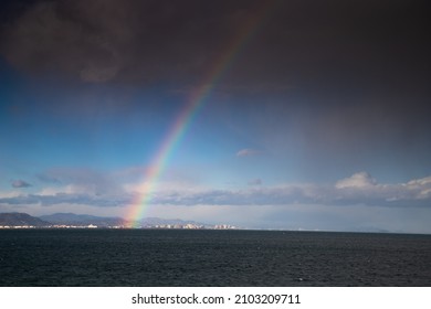 Rainbow Over The Sea Sky Clearing After Storm