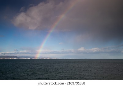 Rainbow Over The Sea Sky Clearing After Storm