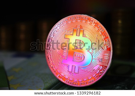 The rainbow physical bitcoin coin is BTC, preferably red and yellow color.