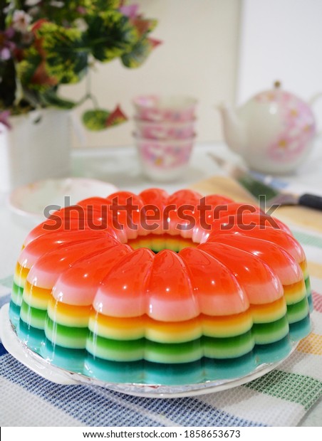 rainbow pudding or pudding layer, every layer\
have different colours and different flavour. and have nice shape.\
Grainy and noise\
textured