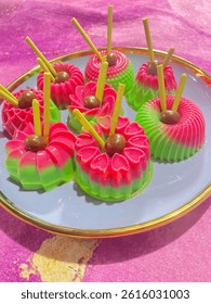 rainbow pudding or pudding layer, Layered pudding made from fresh milk, egg and sugar every layer have different colors and different flavor. and have nice shape. Grainy and noise textured