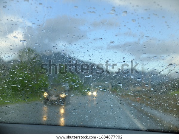 Rainbow Rain Street Window\
Car