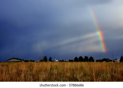 rainbow rays over field