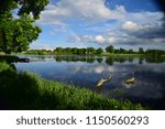 Rainbow reflected in lake