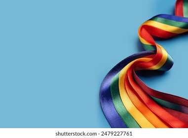 Rainbow Ribbon, LGBTQ, Pride month, Pride colors ribbon design layout, space for text, Fashion, Pride advertising background, wave rainbow, isolated on solid background - Powered by Shutterstock