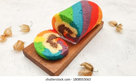 Rainbow Roll Cake With Chocolate Cream Filling.