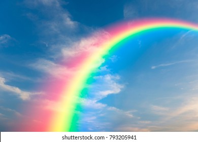 Rainbow and sky background - Shutterstock ID 793205941