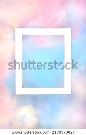 Rainbow sky cloud background with white frame. Abstract colourful minimal pastel coloured border design. LGBT themed nature concept. 