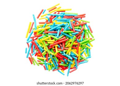 Rainbow Sprinkle For Confectionery, Top View. Colorful Confetti On A White Background, Top View. Confectionery Multi-colored Sprinkles For Decoration. Pile Of Confectionery Sprinkles, Top View.